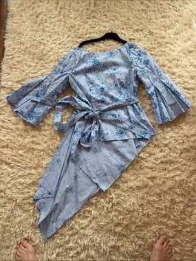 EUC Carolina Herrera Light Blue Floral Wrap Top with Asymmetric Hem